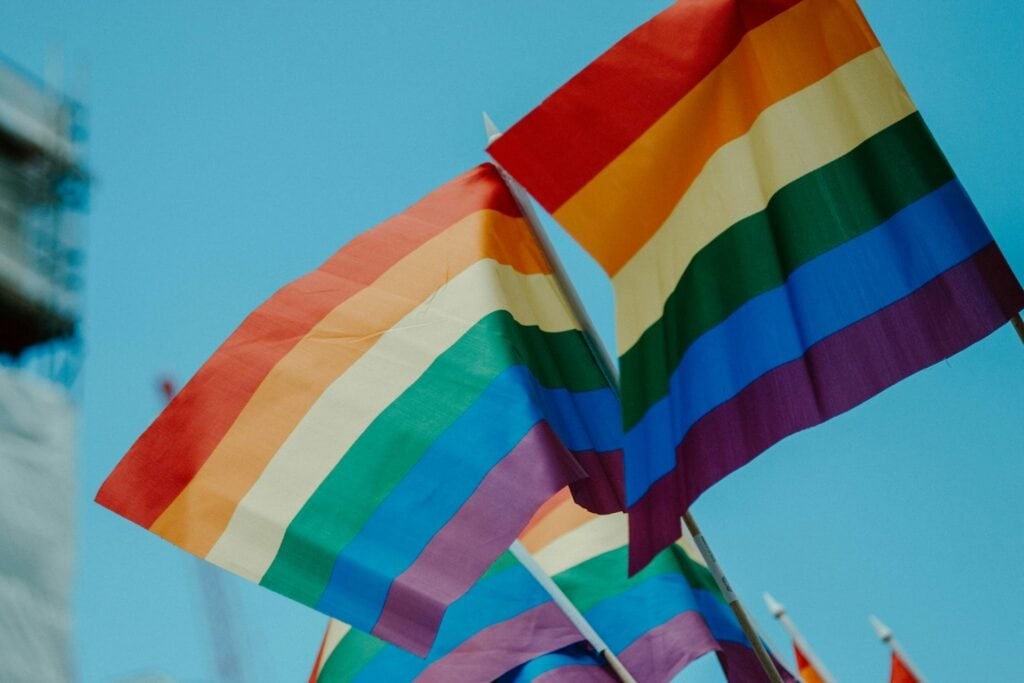 mini pride flags flying in the air