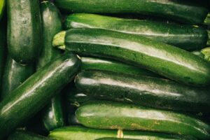a pile of green zucchini