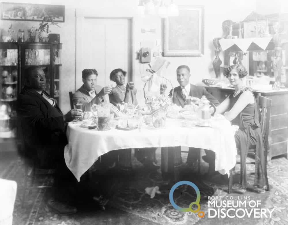 the birdwhistle family seated at a table