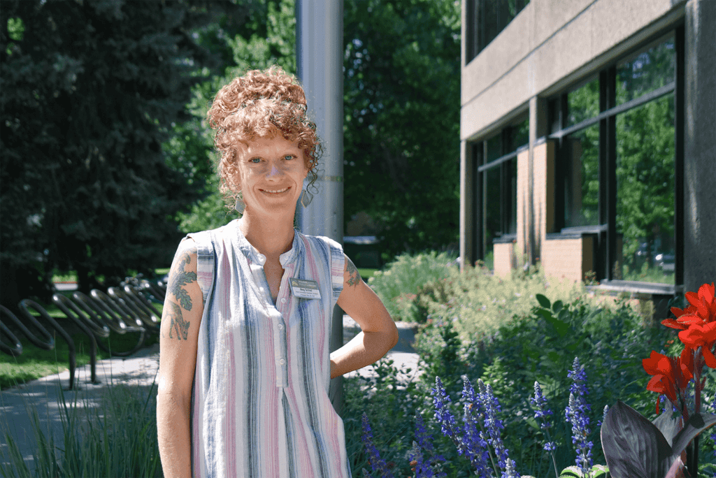 adult librarian meg schiel outside old town library