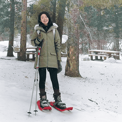 Young woman on skis