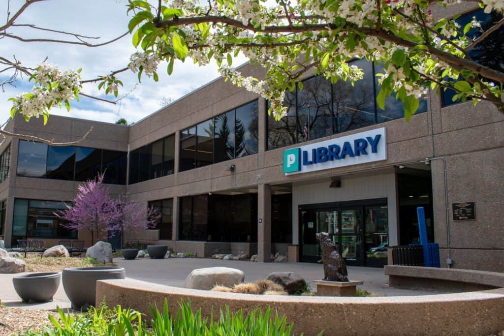 Exterior of Old Town Library with flowering trees