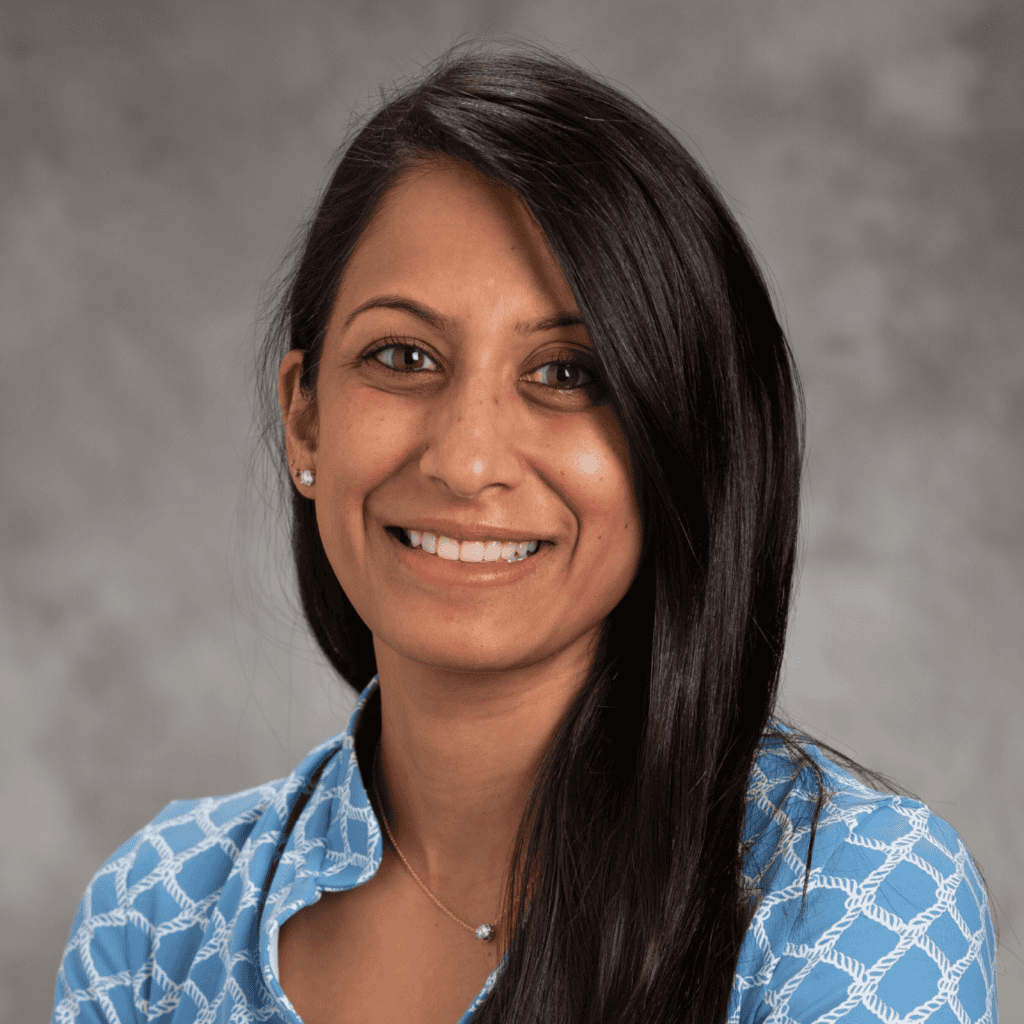 smiling woman with long black hair