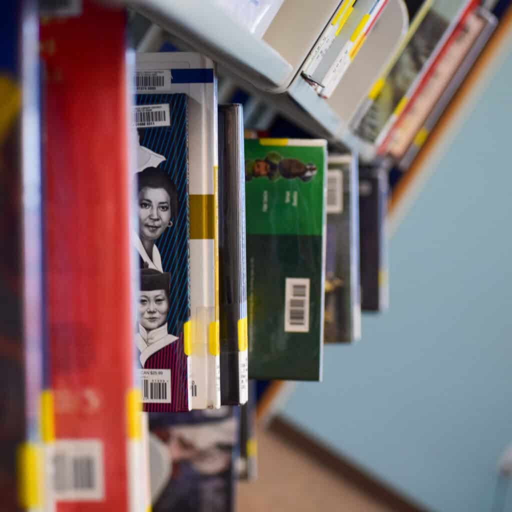 Various books on a shelf in the library