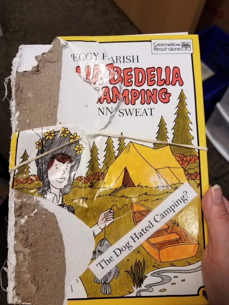 Shredded book with the label "the dog hated camping"