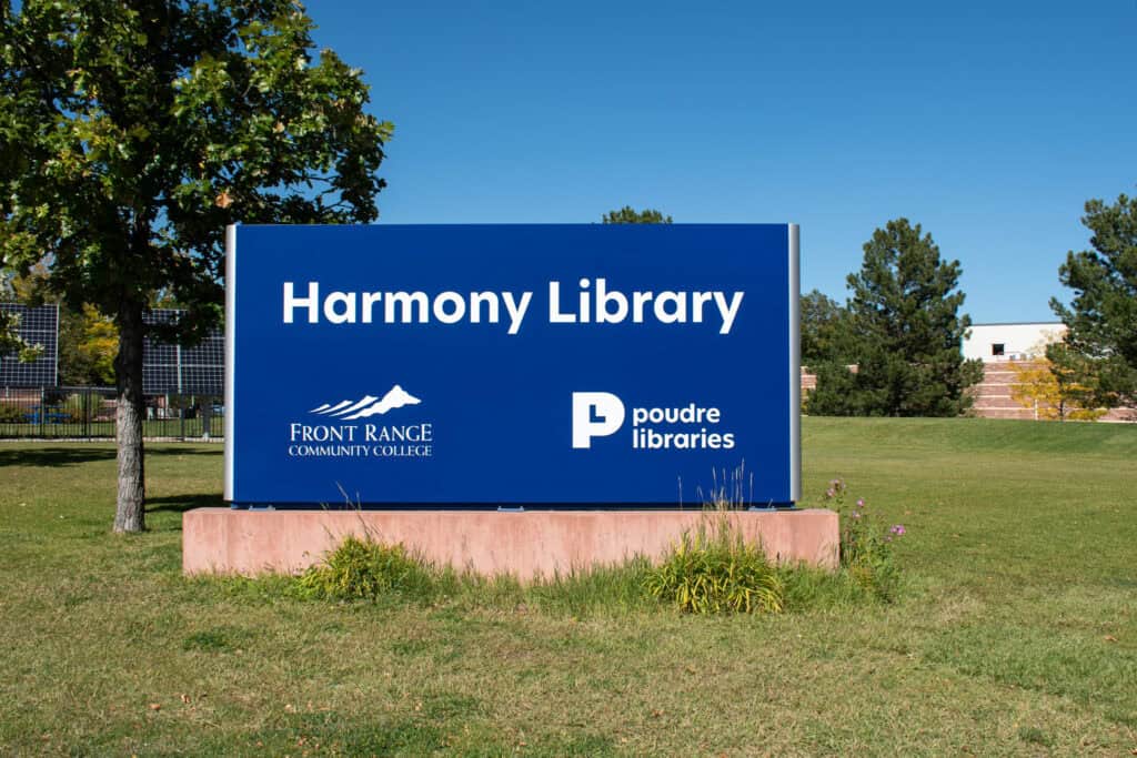 Harmony Library sign in front range community college