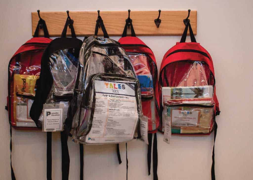 Backpacks filled with literacy activities and books for kids