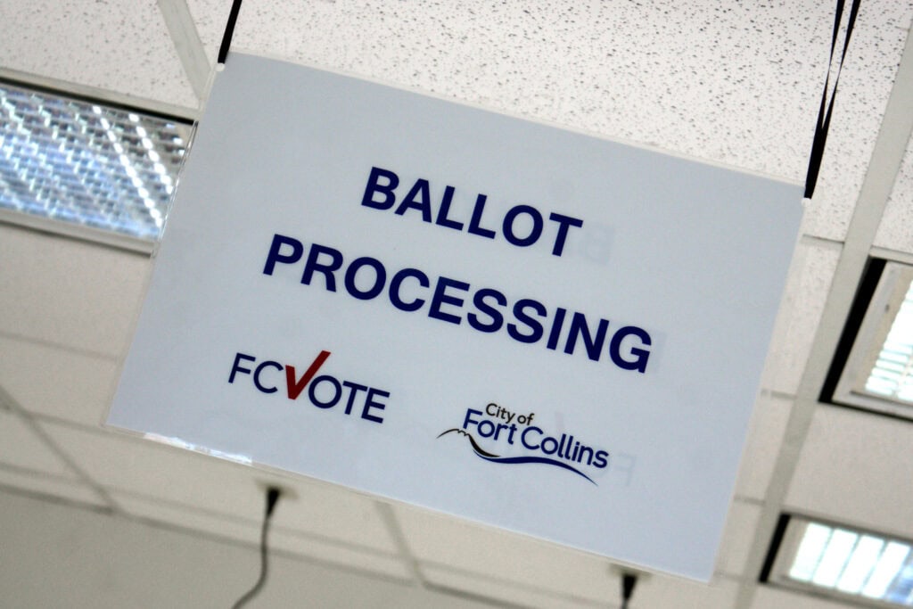 sign reading "ballot processing" in fort collins