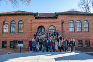 Library staff posing for a photo in front of the Fort Collins Center for Creativity