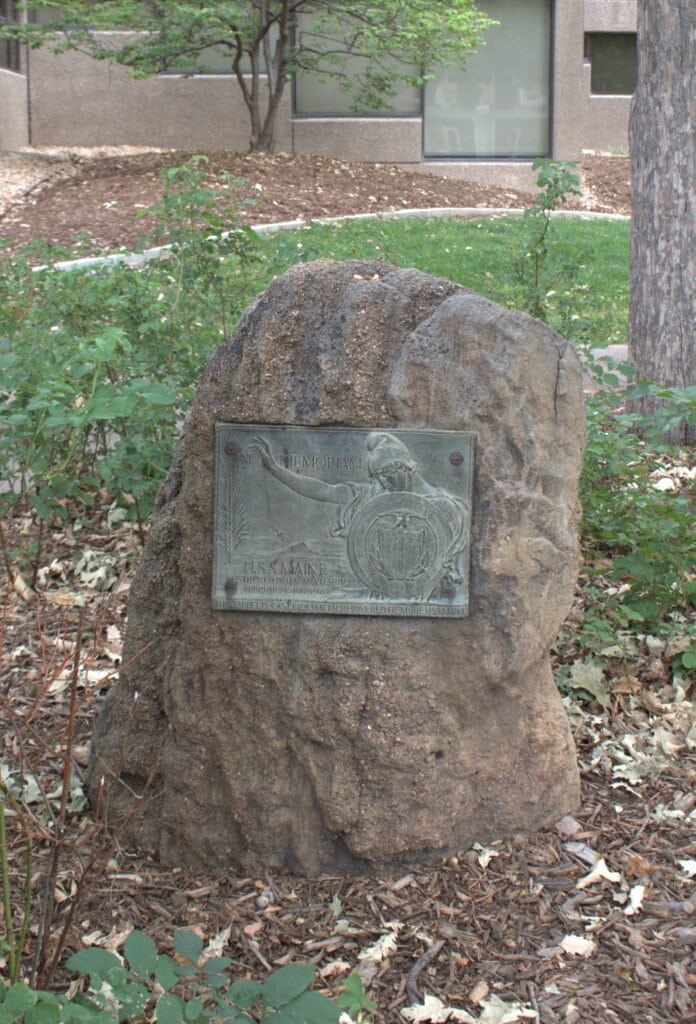 USS Maine memorial plaque in library park.